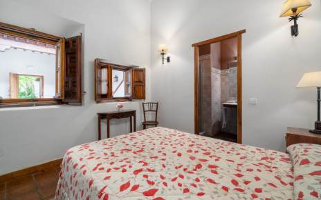 Ground floor with window looking onto interior patio